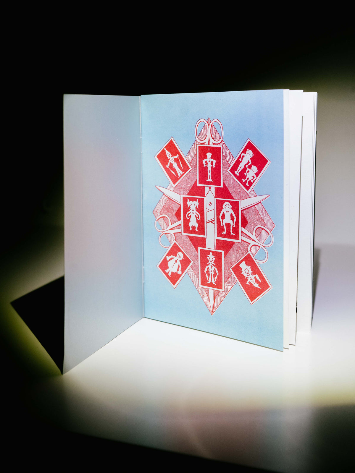 Greeting card with red symbols on a light blue background